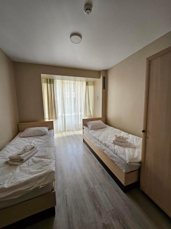 Postel nebo postele na pokoji v ubytování Lion hill