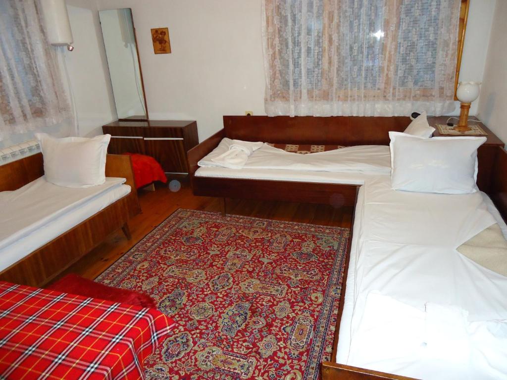Postel nebo postele na pokoji v ubytování Guest House AHP