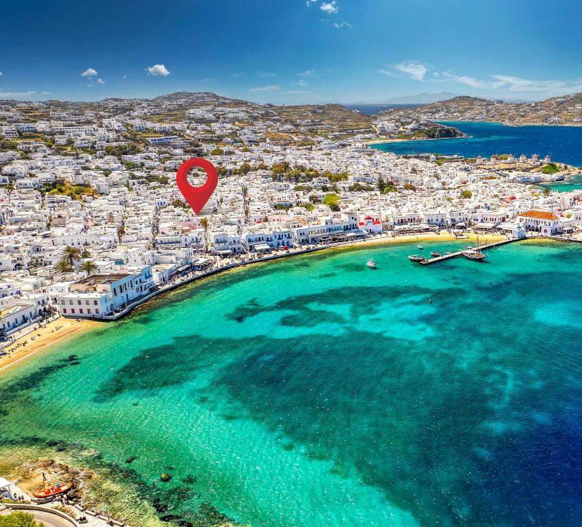 an aerial view of a beach with a red heart balloon at Manto Hotel in Mikonos