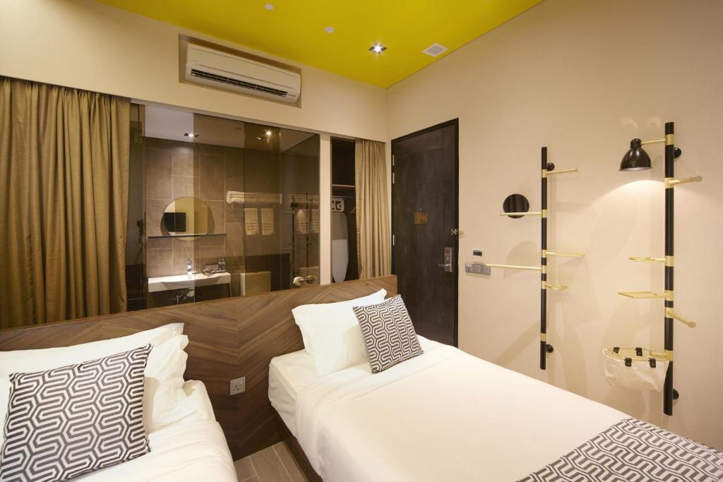 Postel nebo postele na pokoji v ubytování Hotel Yan