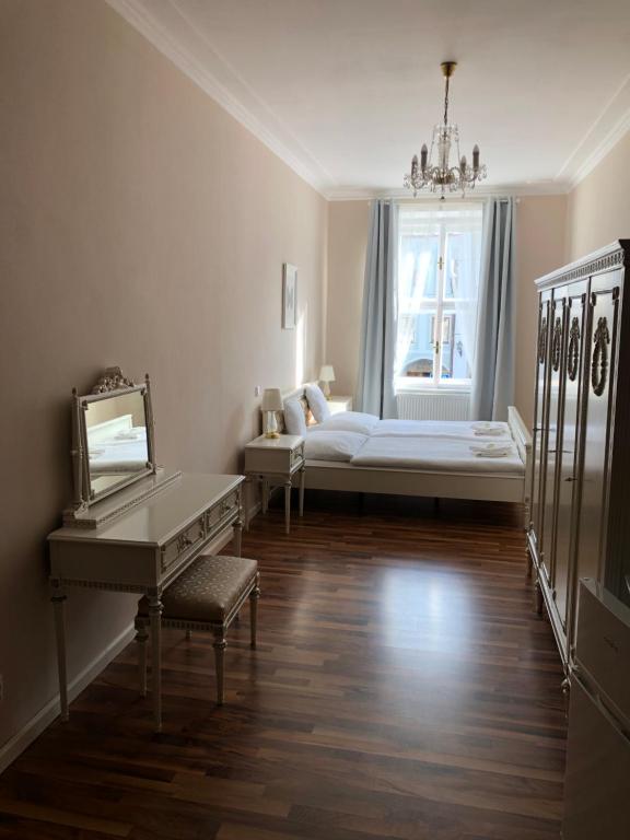Postel nebo postele na pokoji v ubytování Penzion Florián Telč