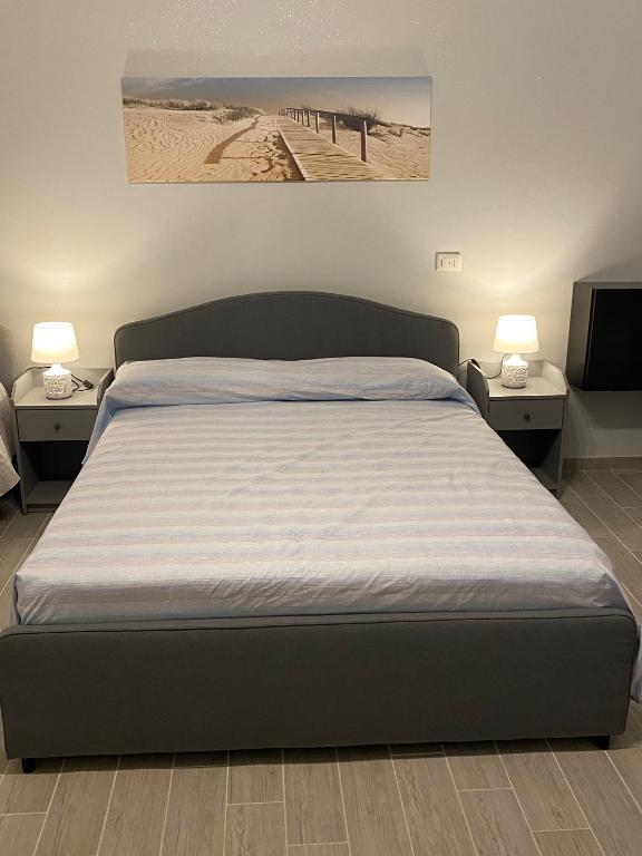Postel nebo postele na pokoji v ubytování Affittacamere Gess