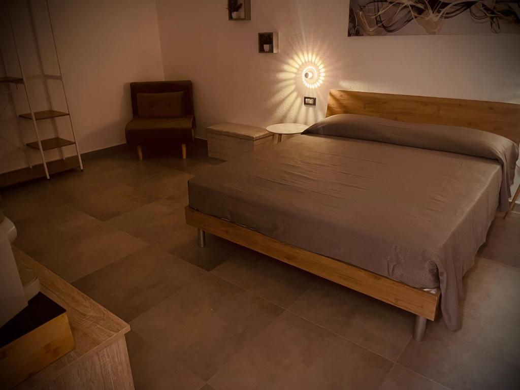 Postel nebo postele na pokoji v ubytování Maquini