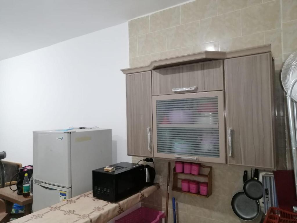 Kuchyň nebo kuchyňský kout v ubytování قرية بلولاجون راس سدر شاليه فاخر للايجار for families only