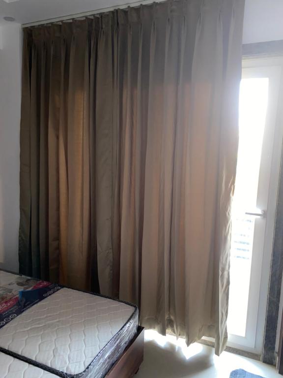 Postel nebo postele na pokoji v ubytování Royal Park Inn