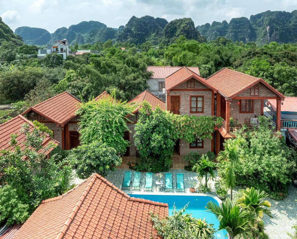 an aerial view of a house with a swimming pool at Trang An Family Homestay in Ninh Binh