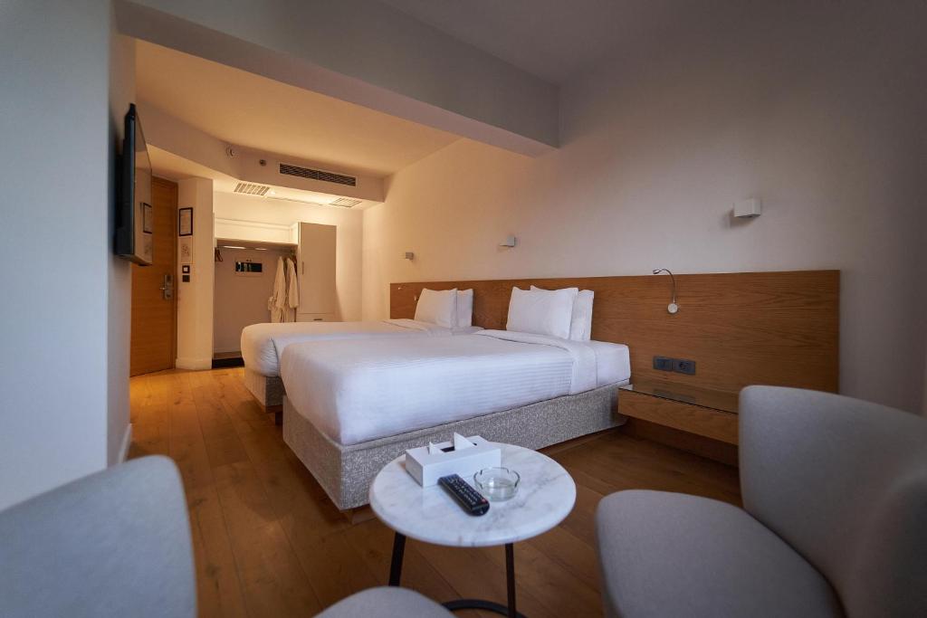Postel nebo postele na pokoji v ubytování New President Hotel Cairo
