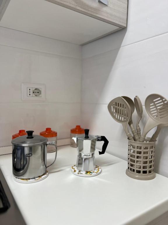 Kuchyň nebo kuchyňský kout v ubytování Appartamenti Minturnae Relais
