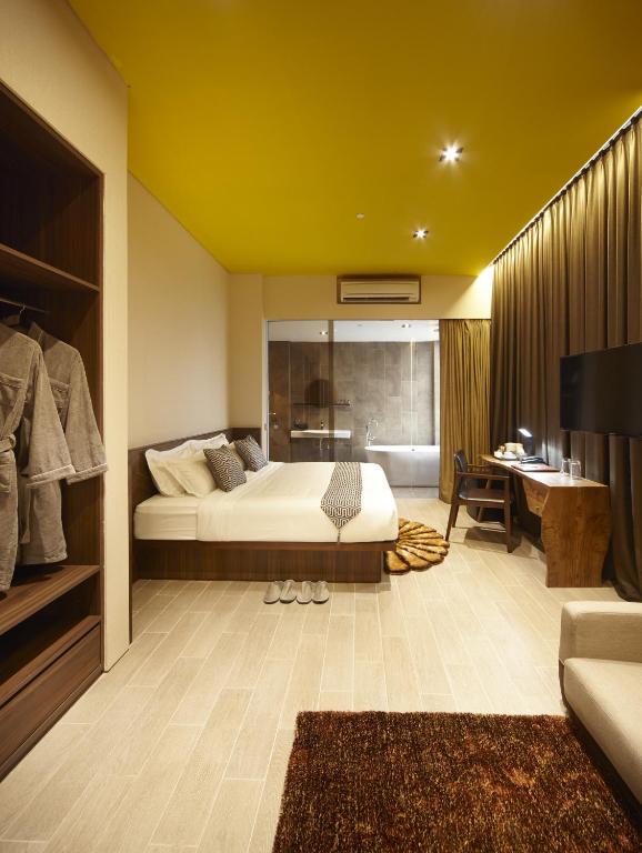 Postel nebo postele na pokoji v ubytování Hotel Yan