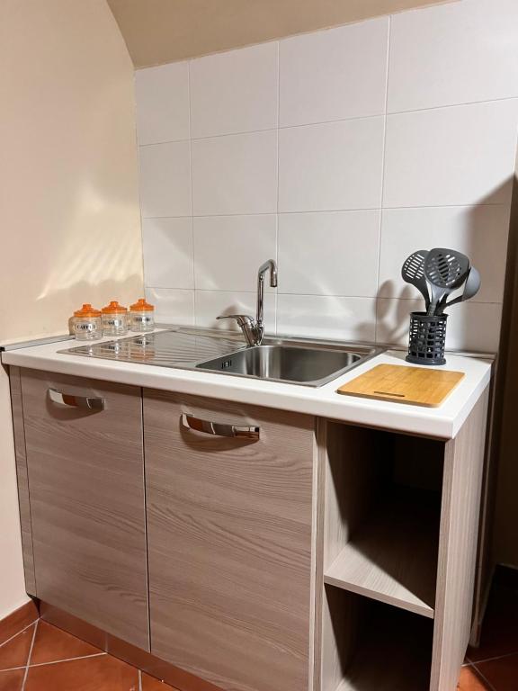 Kuchyň nebo kuchyňský kout v ubytování Appartamenti Minturnae Relais