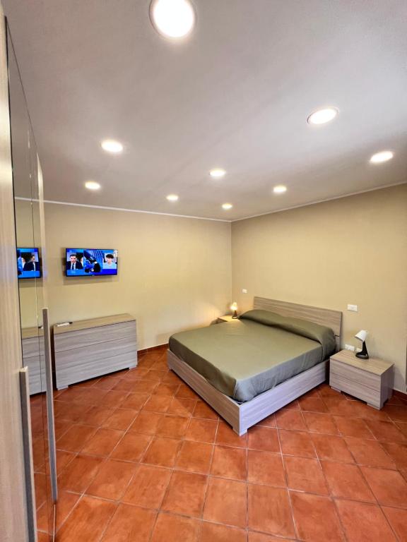 Postel nebo postele na pokoji v ubytování Appartamenti Minturnae Relais