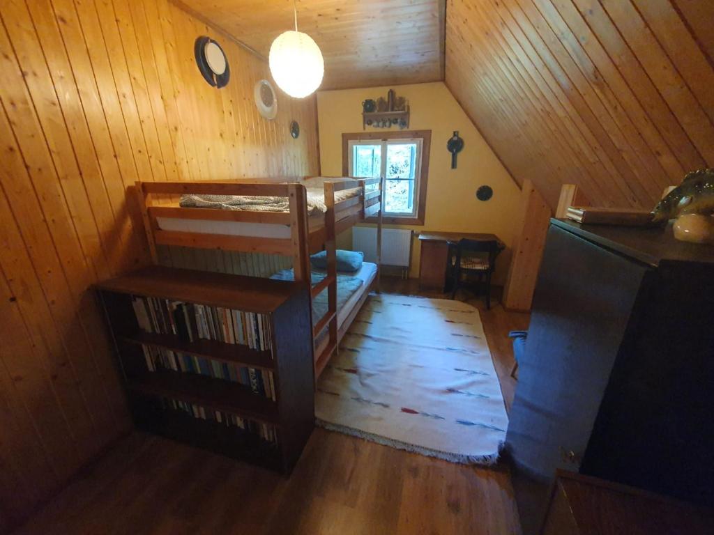 Postel nebo postele na pokoji v ubytování Chata U slepé kočky
