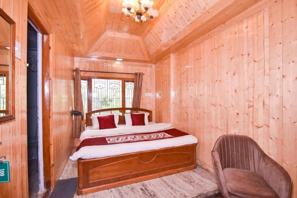 Postel nebo postele na pokoji v ubytování Hotel Avalanche