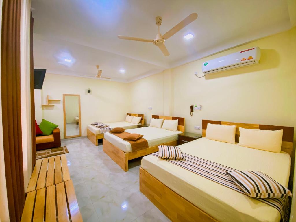 Postel nebo postele na pokoji v ubytování Sparkling Resort Kataragama