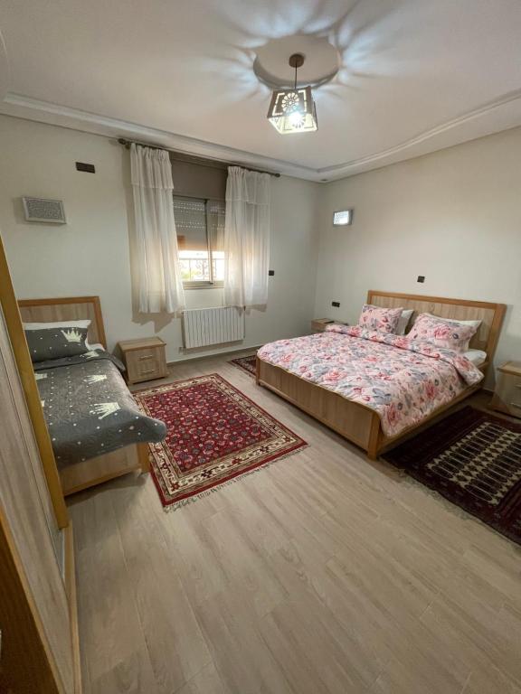 Postel nebo postele na pokoji v ubytování Jaddou Home