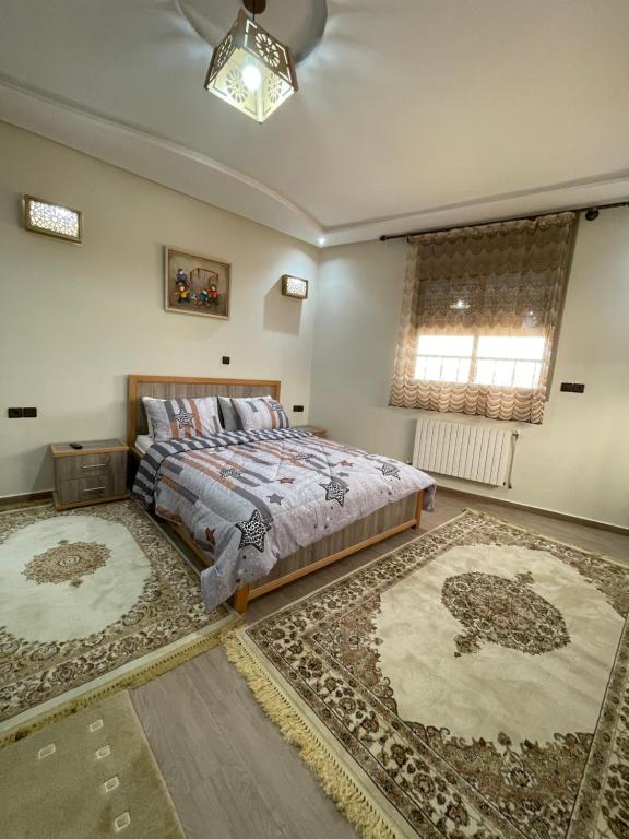 Postel nebo postele na pokoji v ubytování Jaddou Home