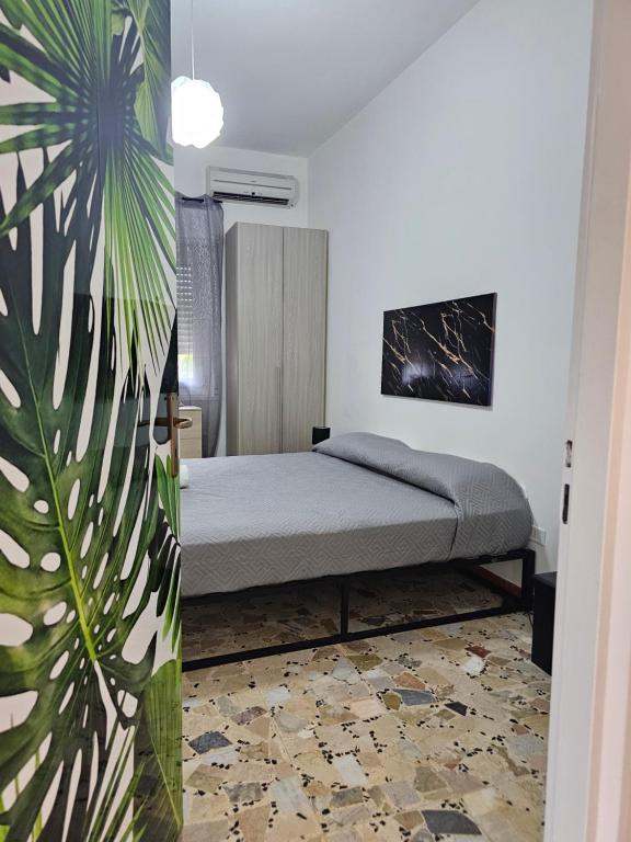 Postel nebo postele na pokoji v ubytování La terrazza del borgo