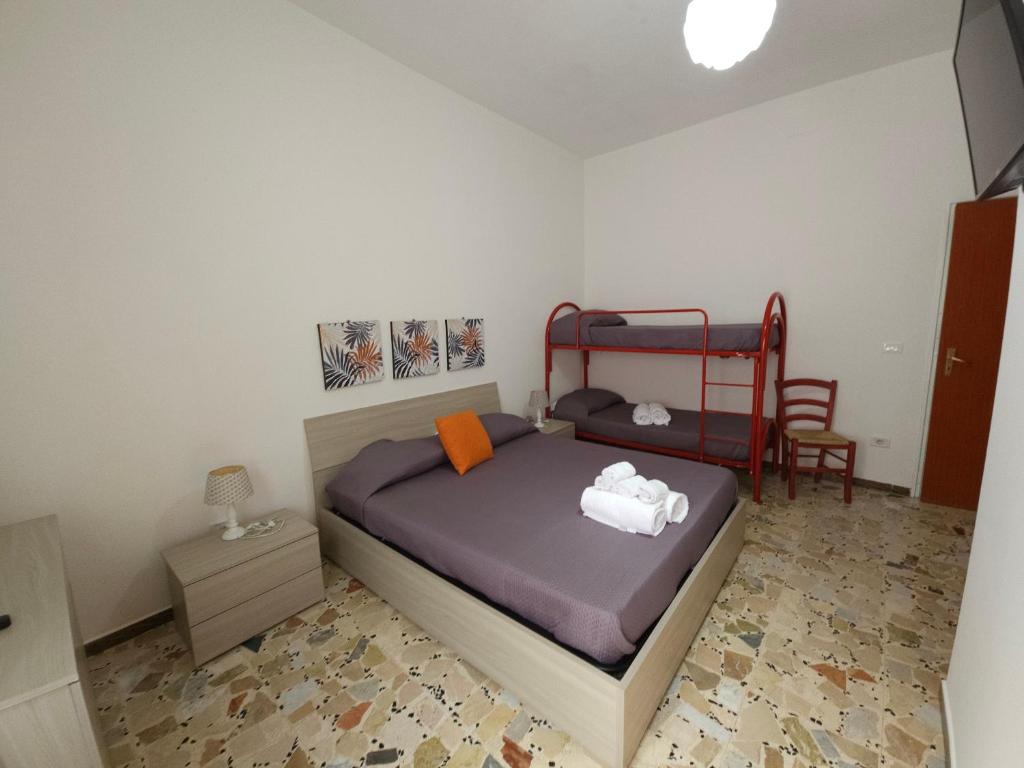 Postel nebo postele na pokoji v ubytování La terrazza del borgo