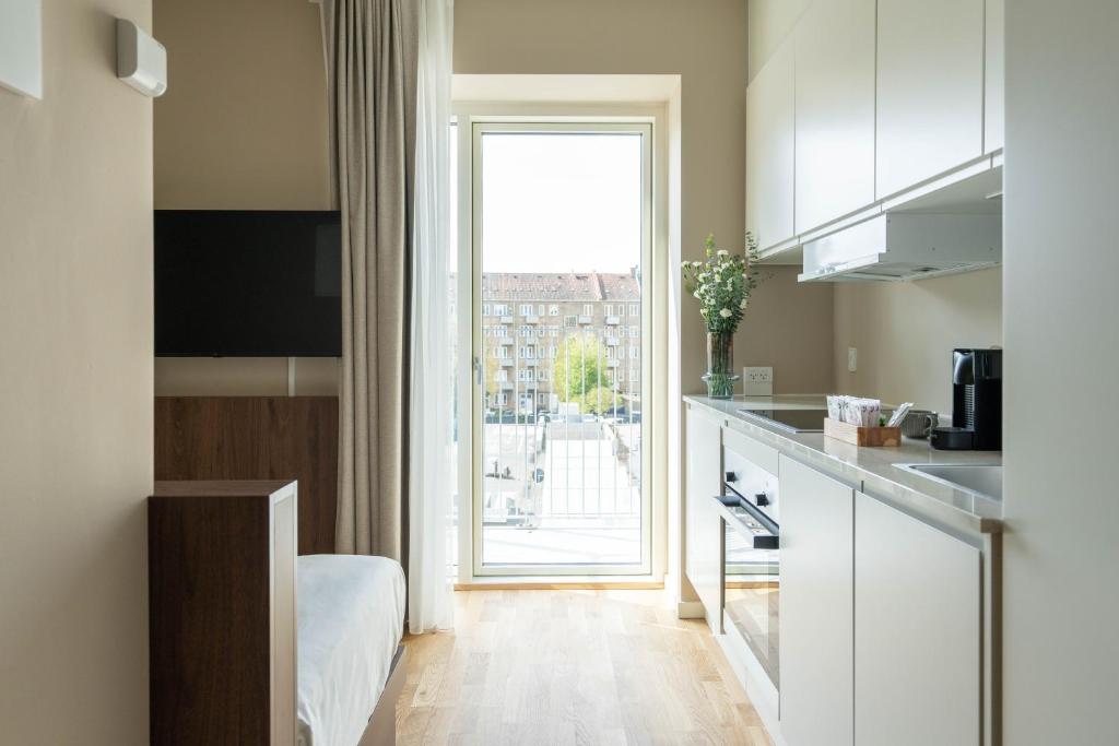 Kuchyň nebo kuchyňský kout v ubytování Numa Copenhagen Nørrebro