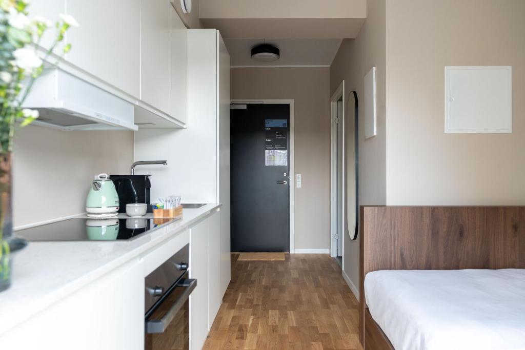 Kuchyň nebo kuchyňský kout v ubytování Numa Copenhagen Nørrebro