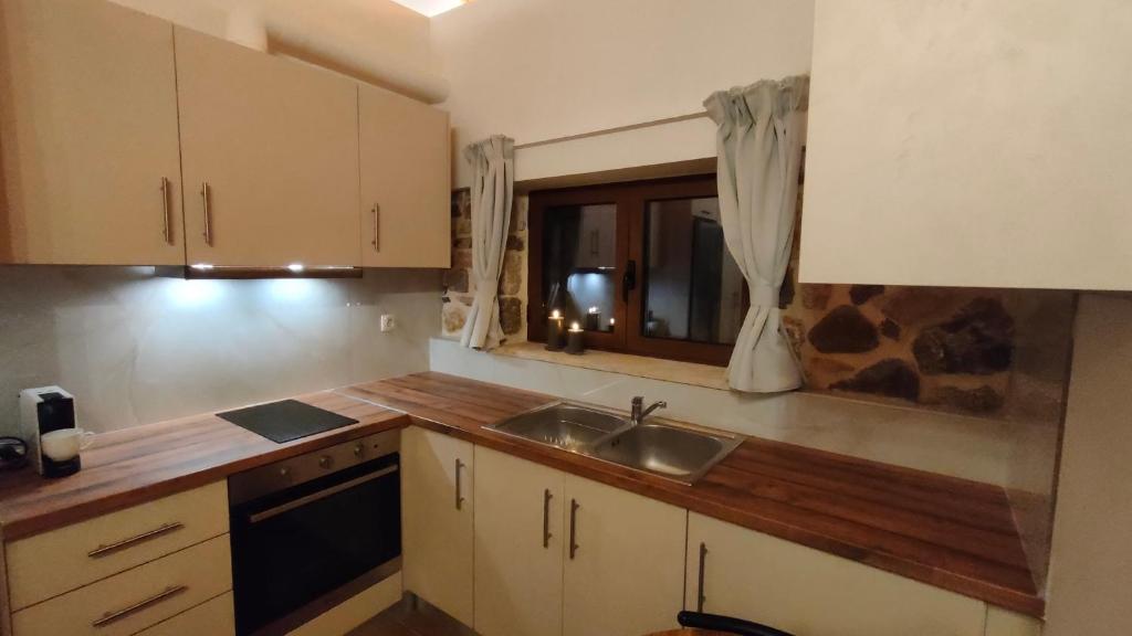 Kuchyň nebo kuchyňský kout v ubytování Nafplio Village