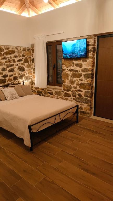 Postel nebo postele na pokoji v ubytování Nafplio Village