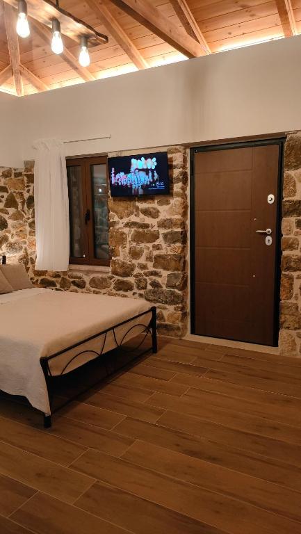 Postel nebo postele na pokoji v ubytování Nafplio Village