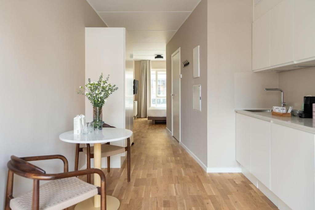 Kuchyň nebo kuchyňský kout v ubytování Numa Copenhagen Nørrebro
