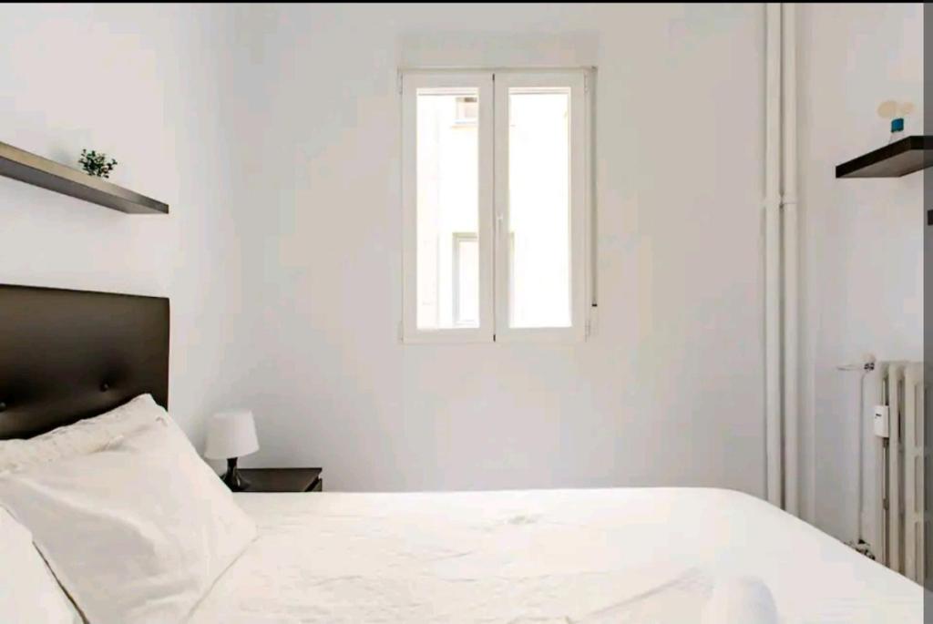 A bed or beds in a room at cómoda habitación