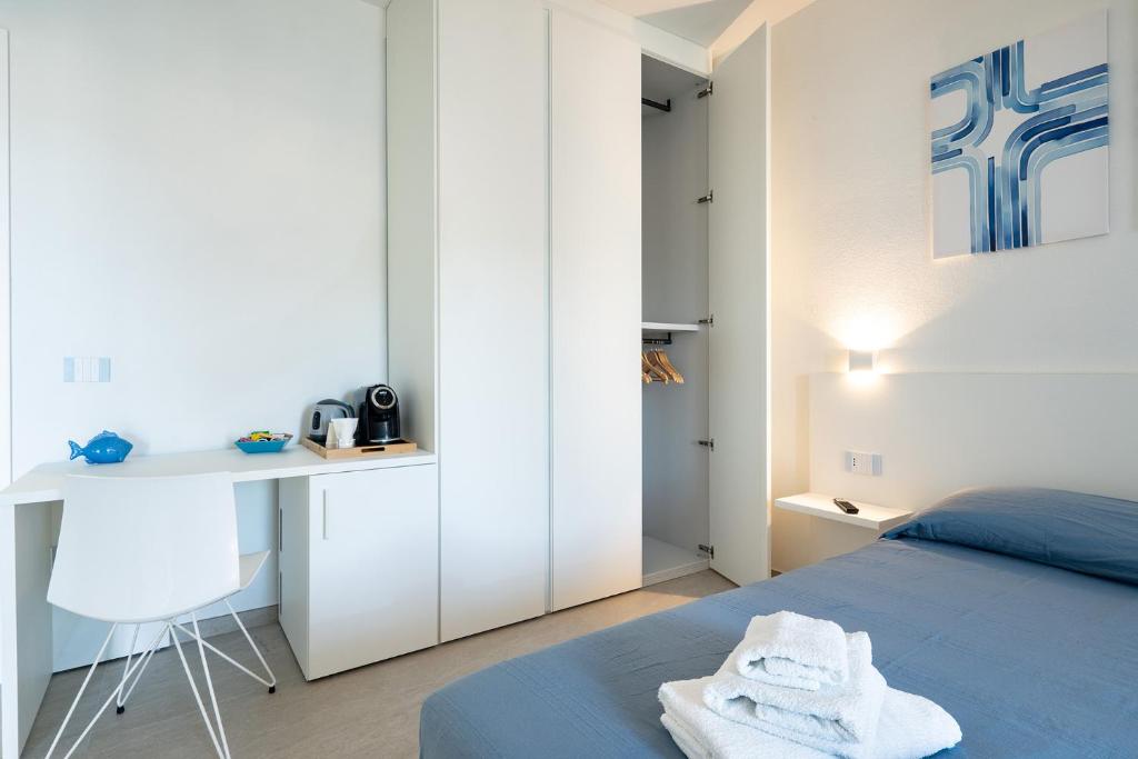 Postel nebo postele na pokoji v ubytování Su Mari Rooms