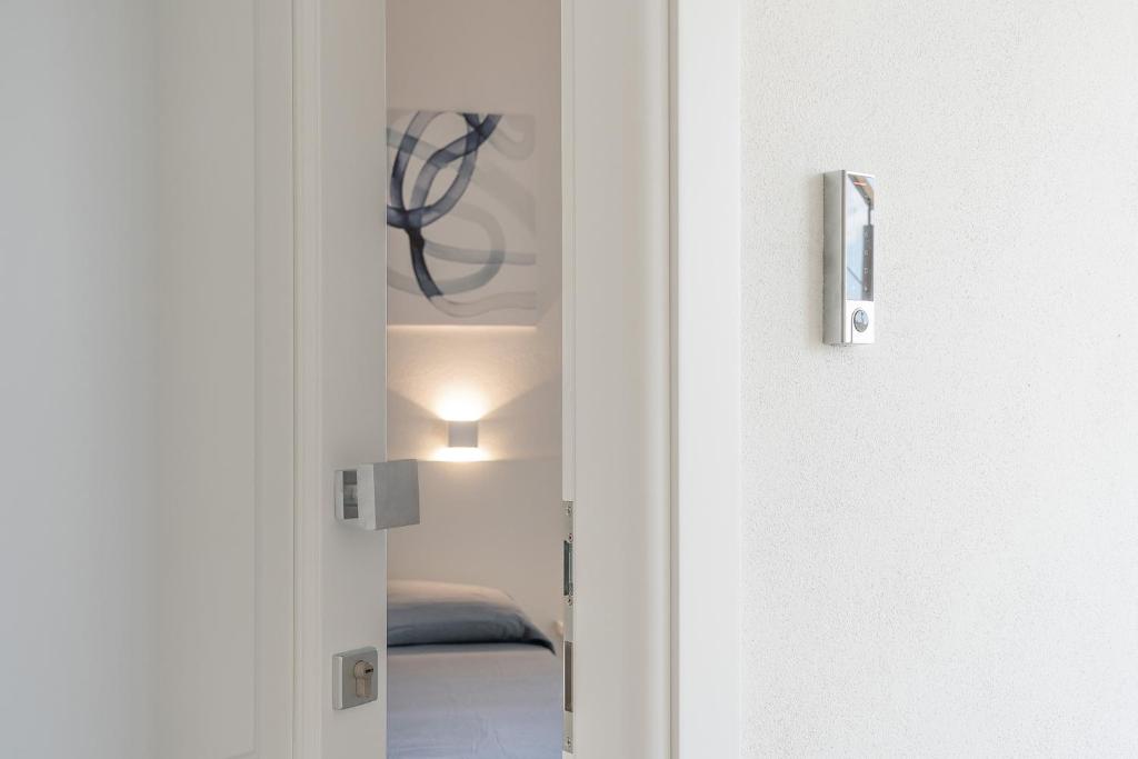 Postel nebo postele na pokoji v ubytování Su Mari Rooms