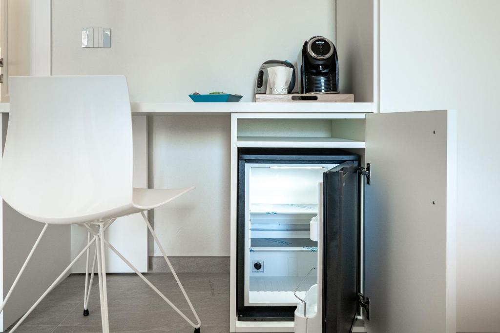 Kuchyň nebo kuchyňský kout v ubytování Su Mari Rooms