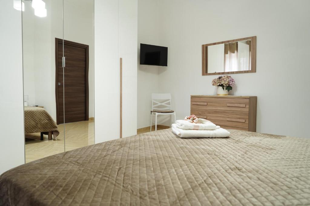 Postel nebo postele na pokoji v ubytování Vesuvius Home