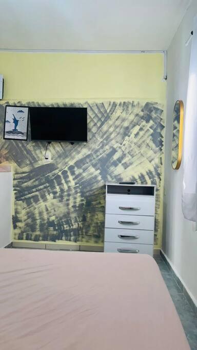 Телевізор і / або розважальний центр в Kitnet Mobiliada itapua Vila Velha