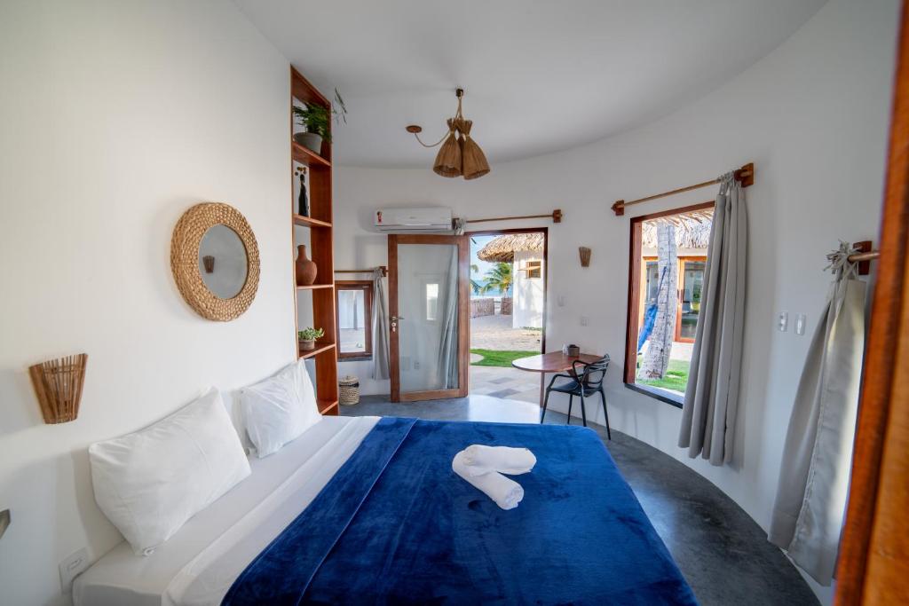 Postel nebo postele na pokoji v ubytování VentoVinte Beach Club