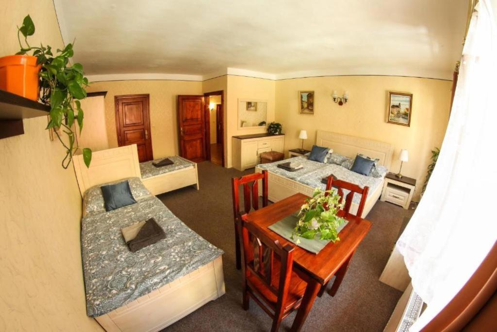 Posezení v ubytování Mini Hotel Abraka & Apartments