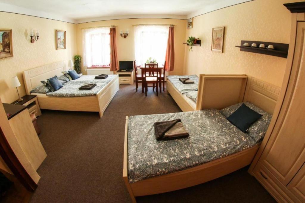 Postel nebo postele na pokoji v ubytování Mini Hotel Abraka & Apartments