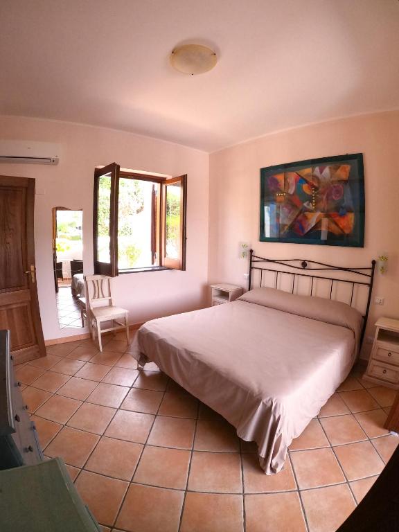 Postel nebo postele na pokoji v ubytování Affittacamere A f r o d i t e