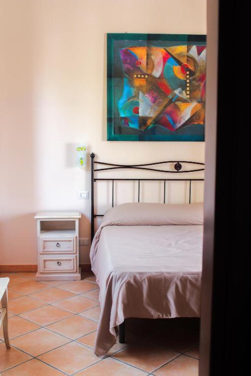 Postel nebo postele na pokoji v ubytování Affittacamere A f r o d i t e