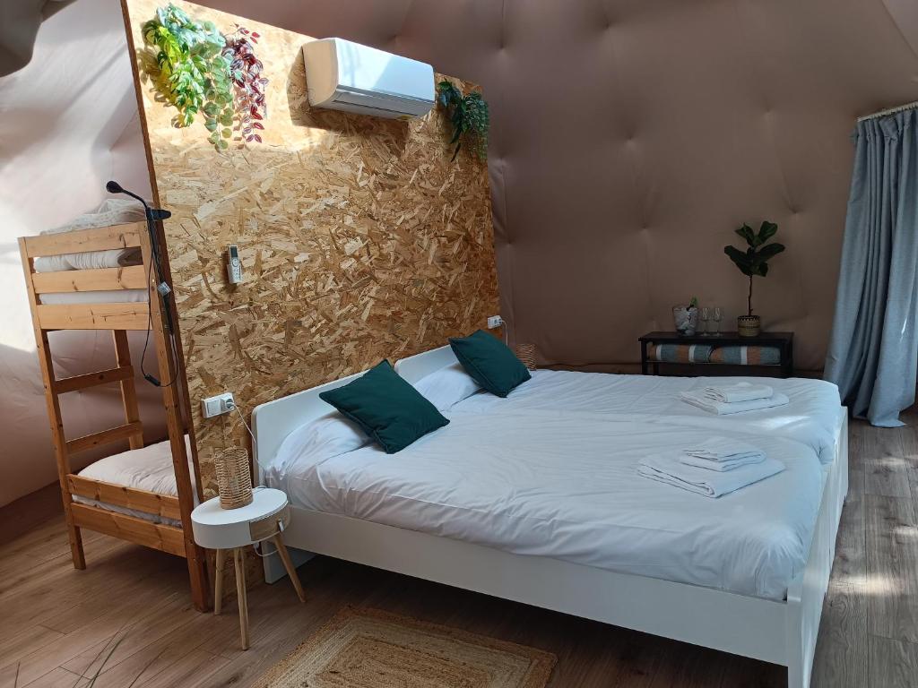 Postel nebo postele na pokoji v ubytování Glamping Cañon del Rio Lobos