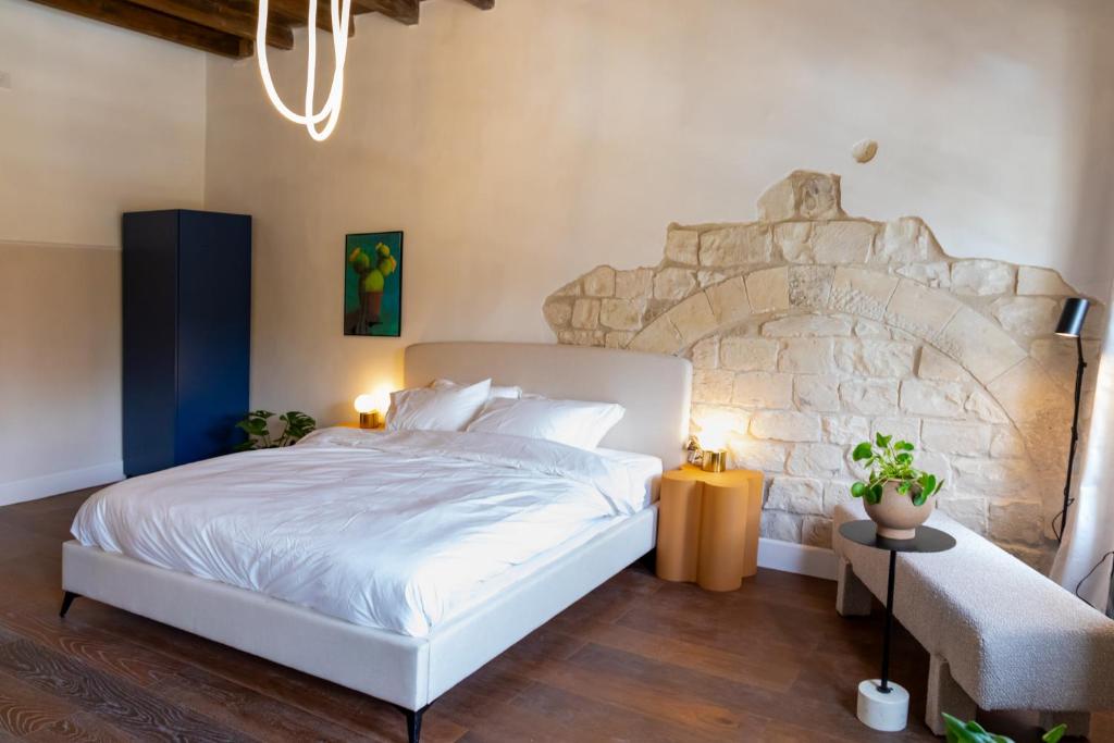 Postel nebo postele na pokoji v ubytování Mila - Boutique Hotel