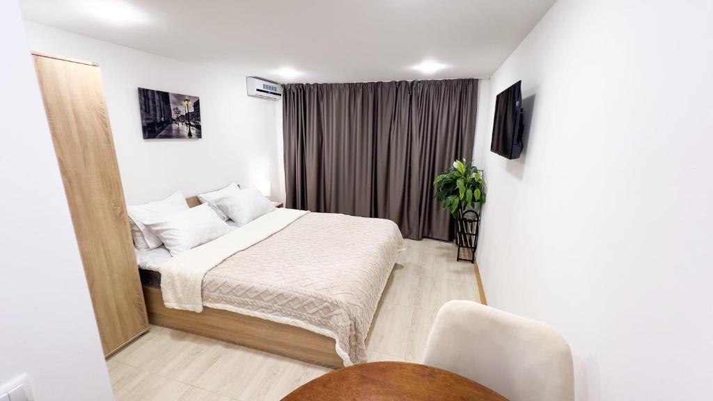 Giường trong phòng chung tại Charming flat with terrace