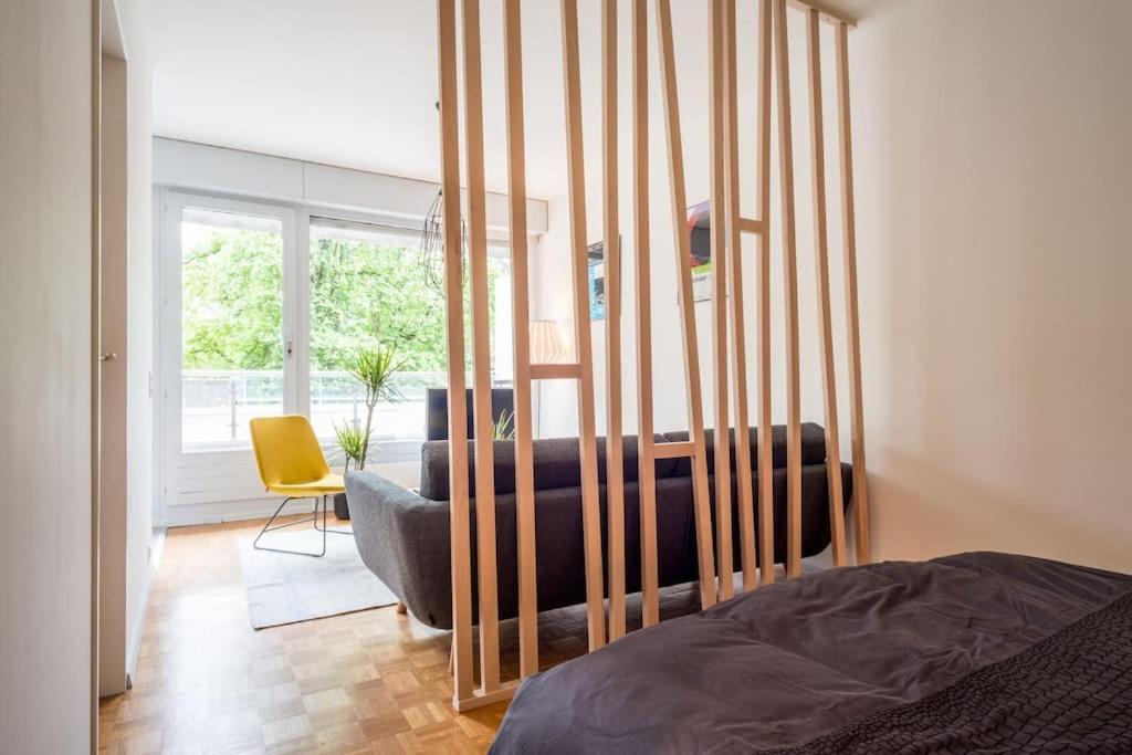 Postel nebo postele na pokoji v ubytování Aurora Suite à Champel avec terrasse
