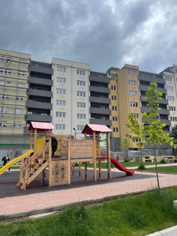 a park with a playground with a slide at Bela in Kumanovo