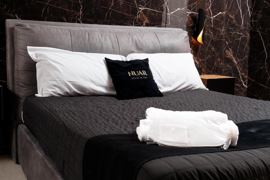 Posteľ alebo postele v izbe v ubytovaní Nuar suite&spa