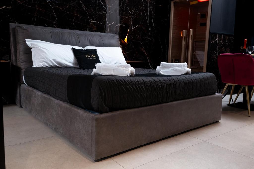Posteľ alebo postele v izbe v ubytovaní Nuar suite&spa