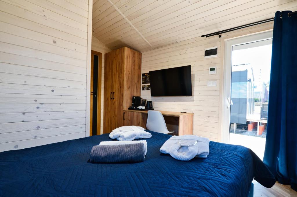 Postel nebo postele na pokoji v ubytování Holiday Park Zator Resort & Spa