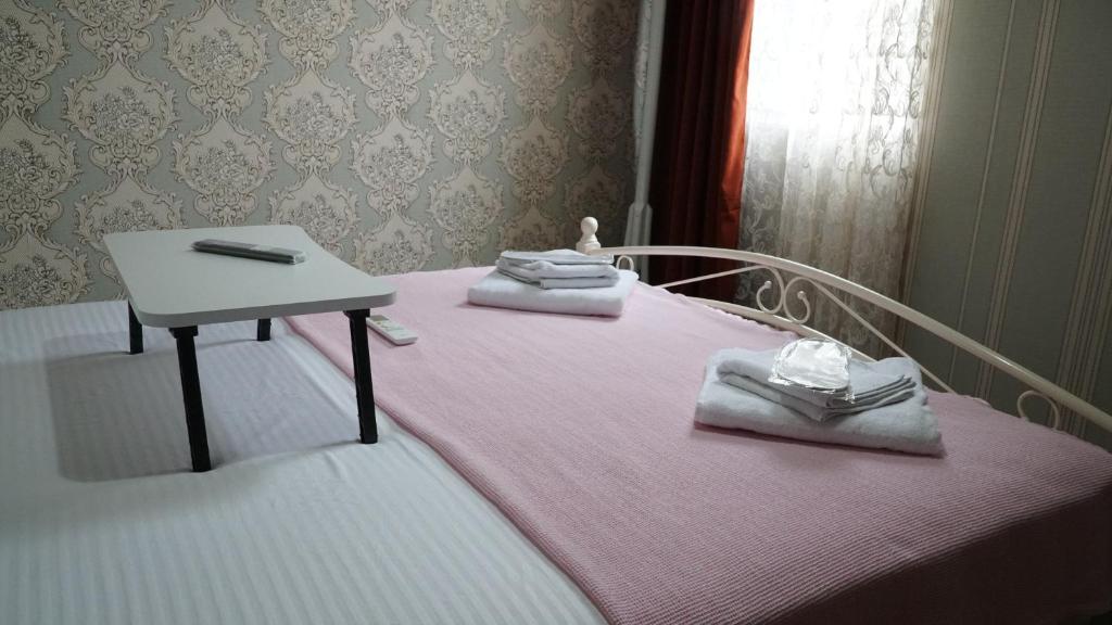 Postel nebo postele na pokoji v ubytování Eleven Guest House