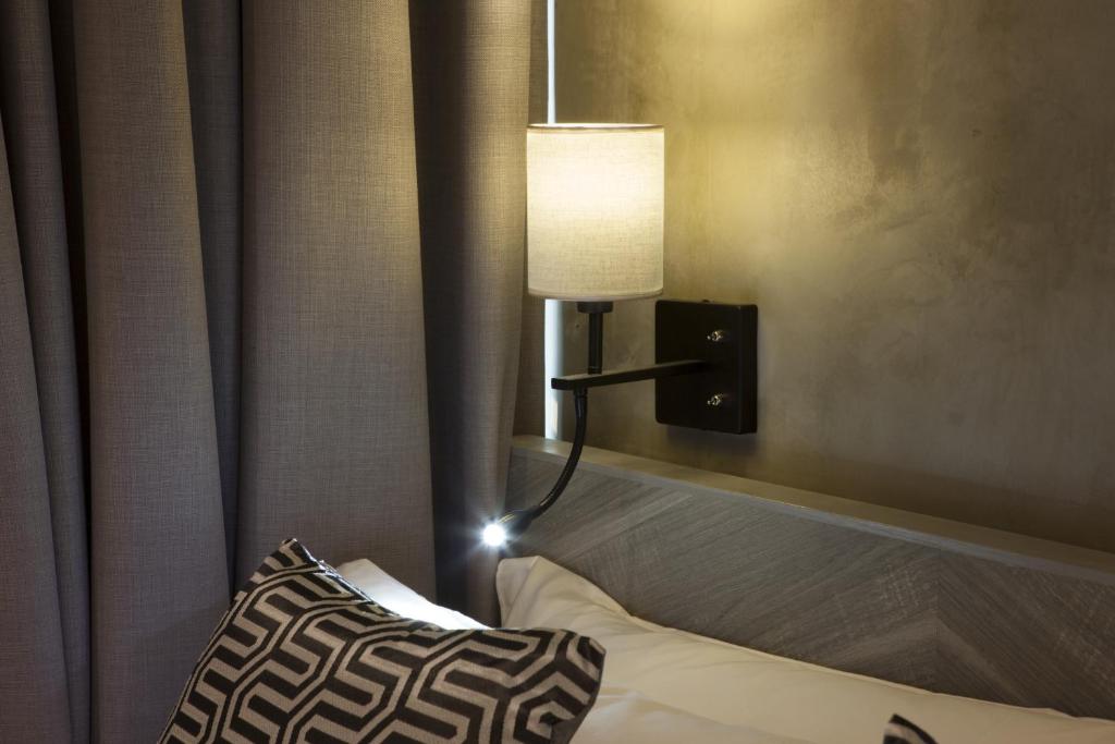 Postel nebo postele na pokoji v ubytování Hotel Yan