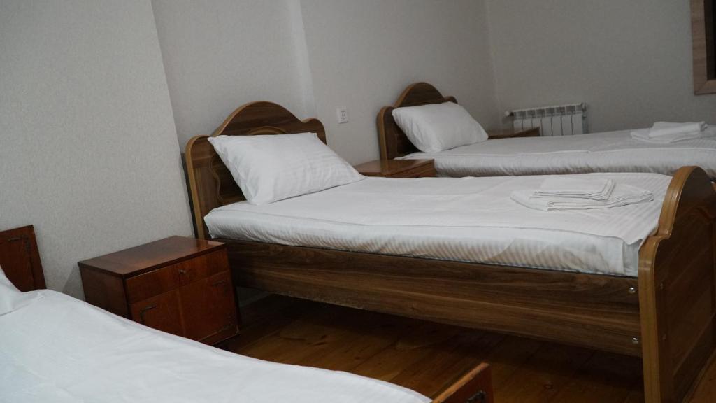 Postel nebo postele na pokoji v ubytování Eleven Guest House